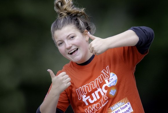 A walker giving thumbs up on the course at the Jimmy Fund Walk
