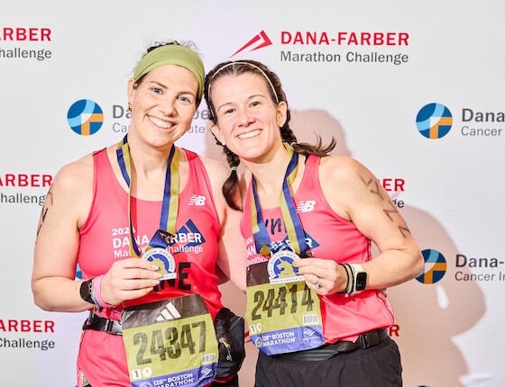 Runners on the Dana-Farber Marathon Challenge team celebrate after running the Boston Marathon