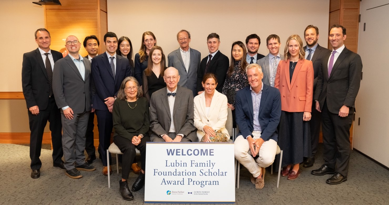 Members of the Lubin Family Foundation and mentors with a ‘Welcome, Lubin Family Foundation Scholar Award Program’ sign