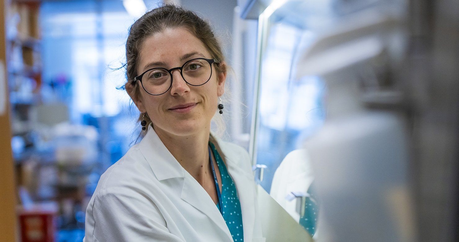 Dana-Farber researcher sits in the lab
