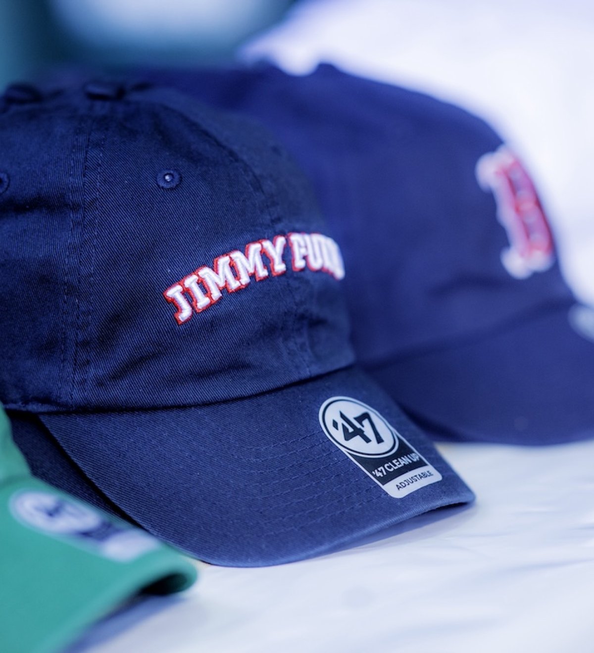 Jimmy Fund and Red Sox baseball hats