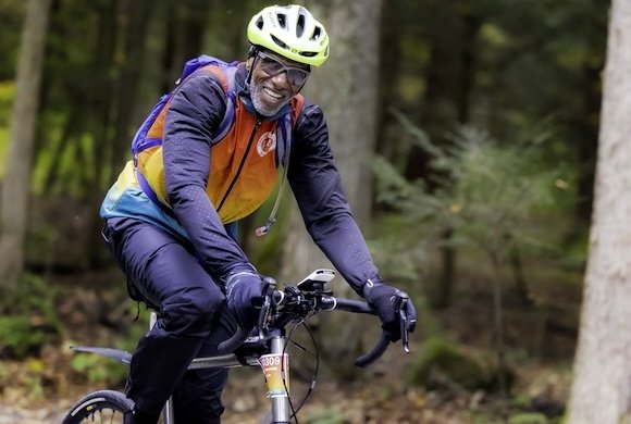 A rider in the woods for PMC Unpaved