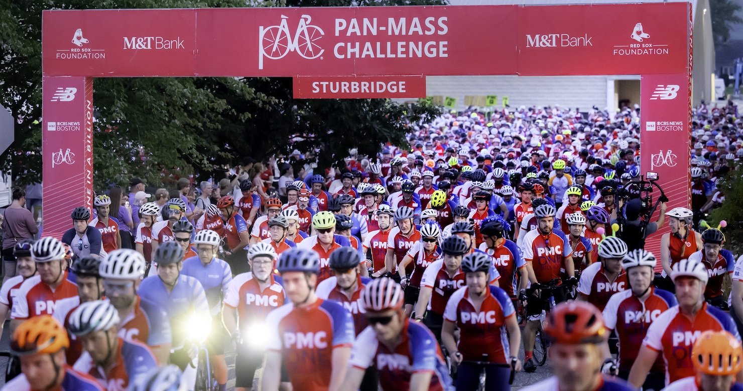 A group of bikers at a Pan-Mass Challenge start line