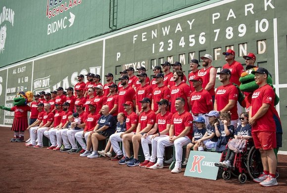 The Boston Red Sox with Jimmy Fund patients at Fenway Park