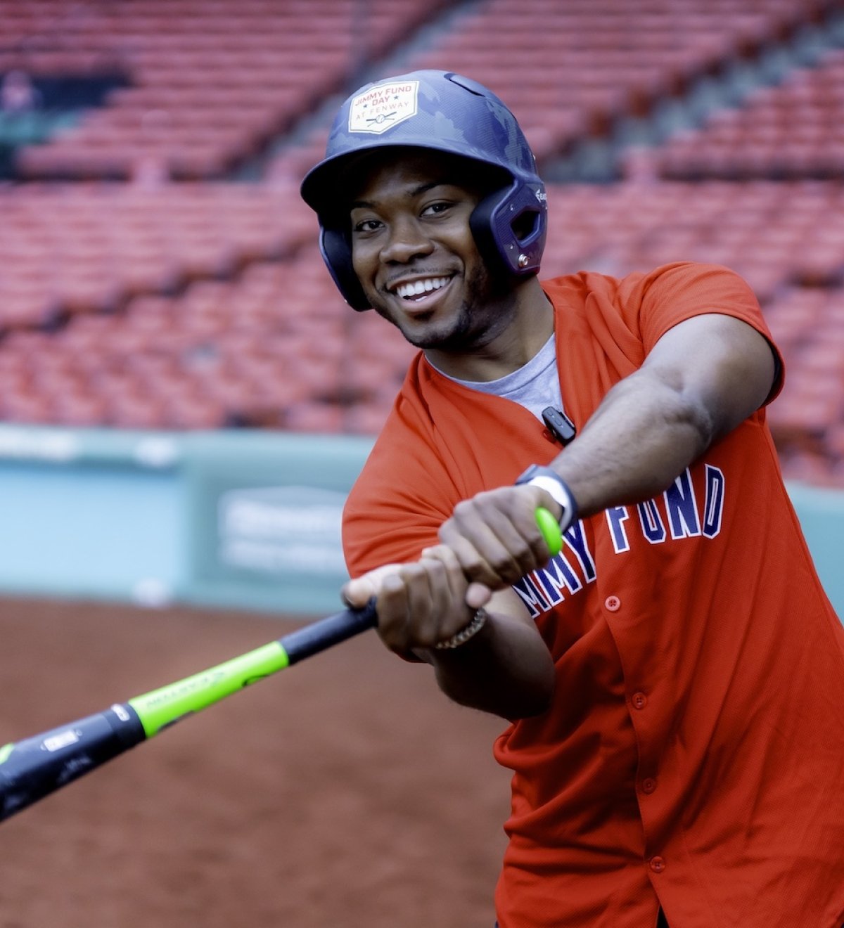 Jimmy Fund Day participant batting at Fenway Park