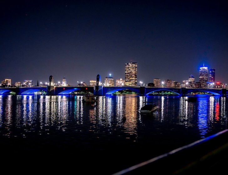 Skyline of Boston, lit up blue for the Jimmy Fund