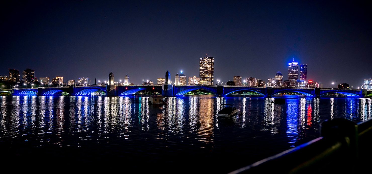 Skyline of Boston, lit up blue for the Jimmy Fund