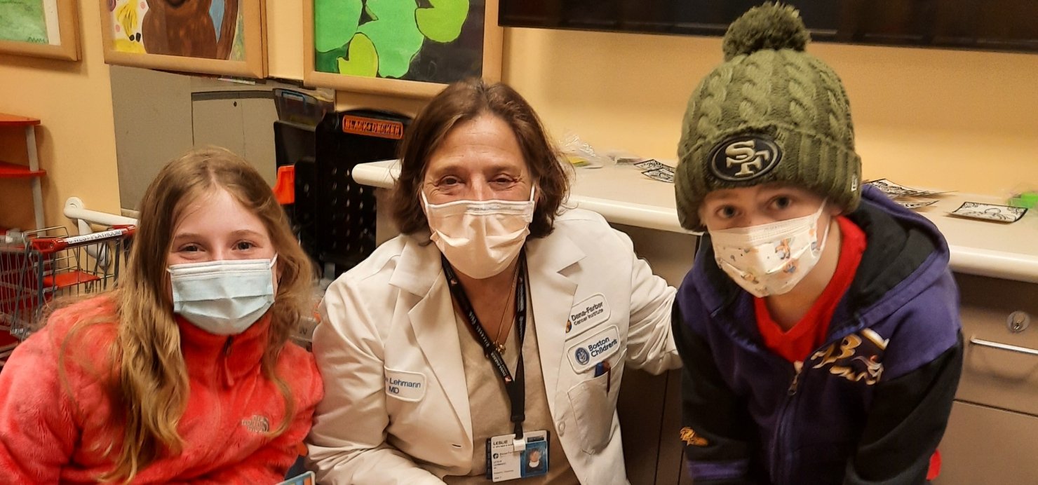 Keene and Heeth stand together with a doctor