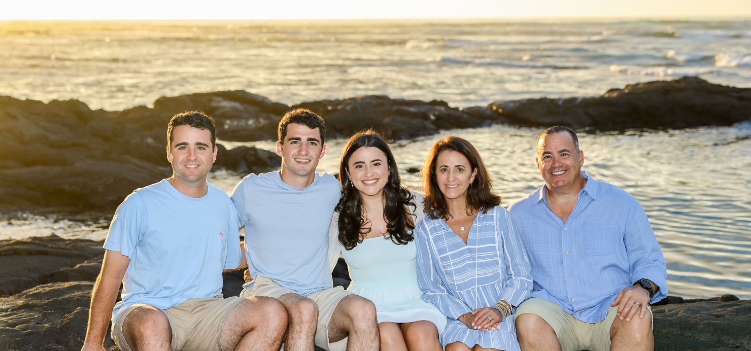 Family of five on the beach