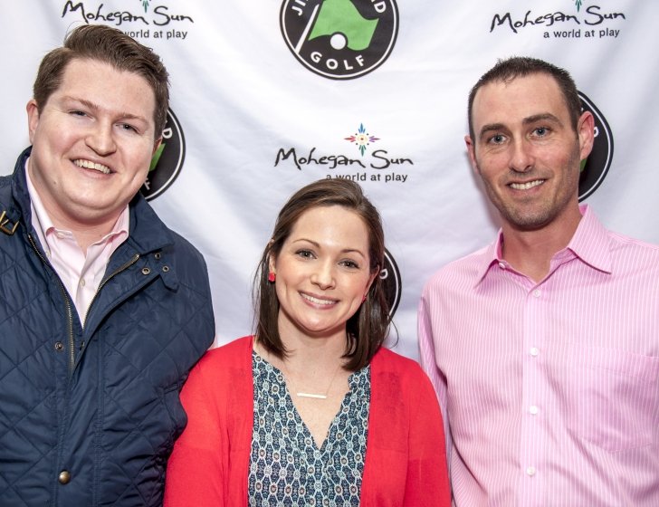 Three people in front of a Jimmy Fund Golf backdrop