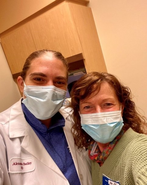 Patient and doctor wearing face masks