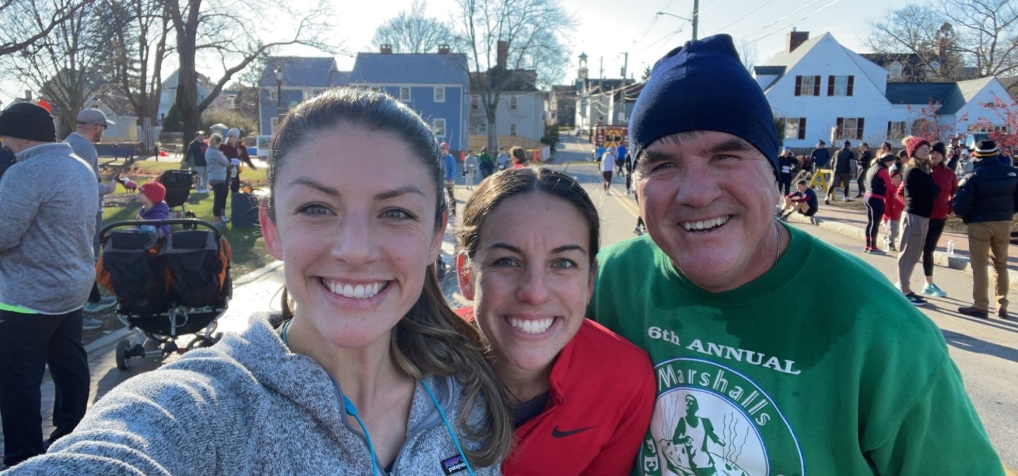 John at a race with his daughters