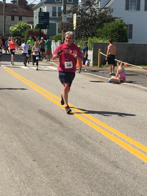 John running on a race course