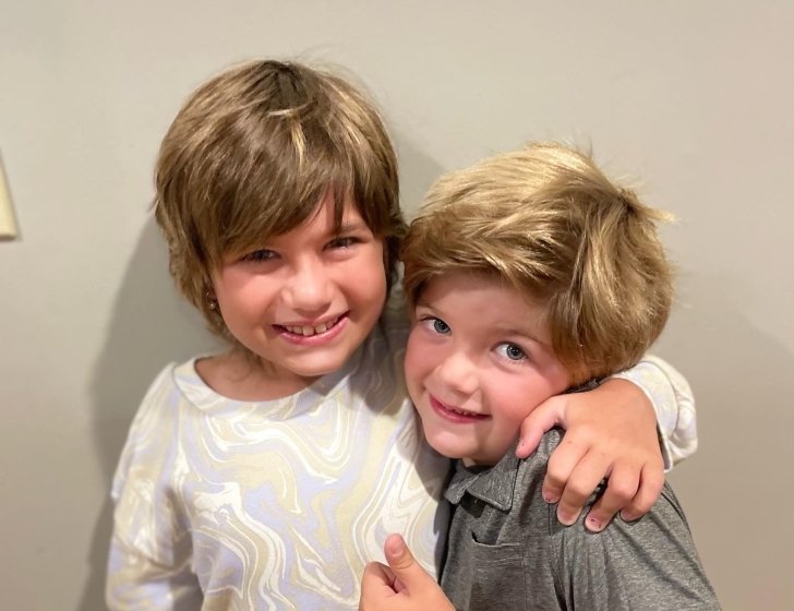 Chloe and her brother hugging