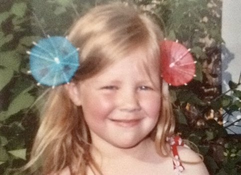 Bridget with little umbrellas in her hair