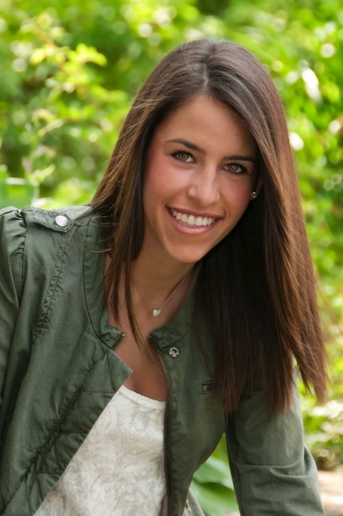 Haley in front of trees