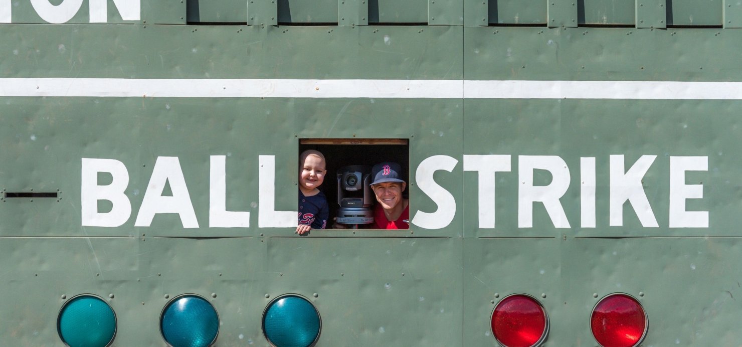 Patient and Brock Holt look out from Green Monster at Fenway Park