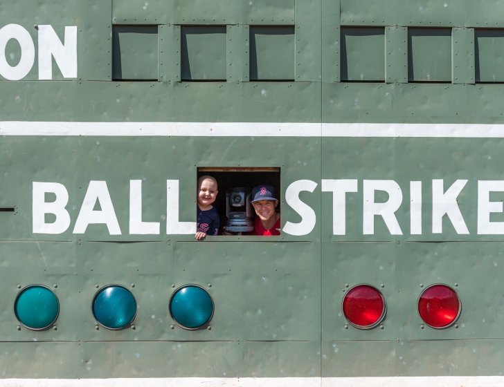 Patient and Brock Holt look out from Green Monster at Fenway Park