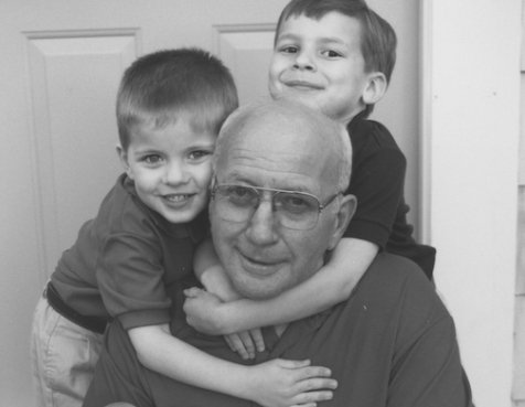 Black and white photo of the original Jimmy Einar Gustafson and his grandchildren