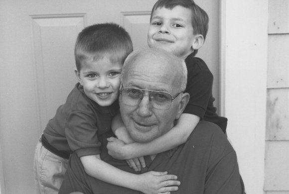Black and white photo of the original Jimmy Einar Gustafson and his grandchildren