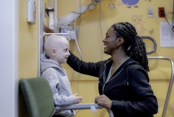 Dana-Farber staff takes the height of a young patient