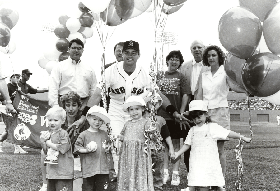 Black and white photo of Dana-Farber pediatrics patients with a Red Sox player